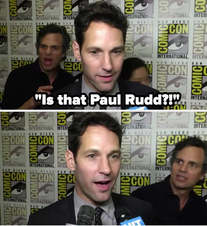 Paul Rudd giving an interview and Mark Ruffalo coming up behind him surprised